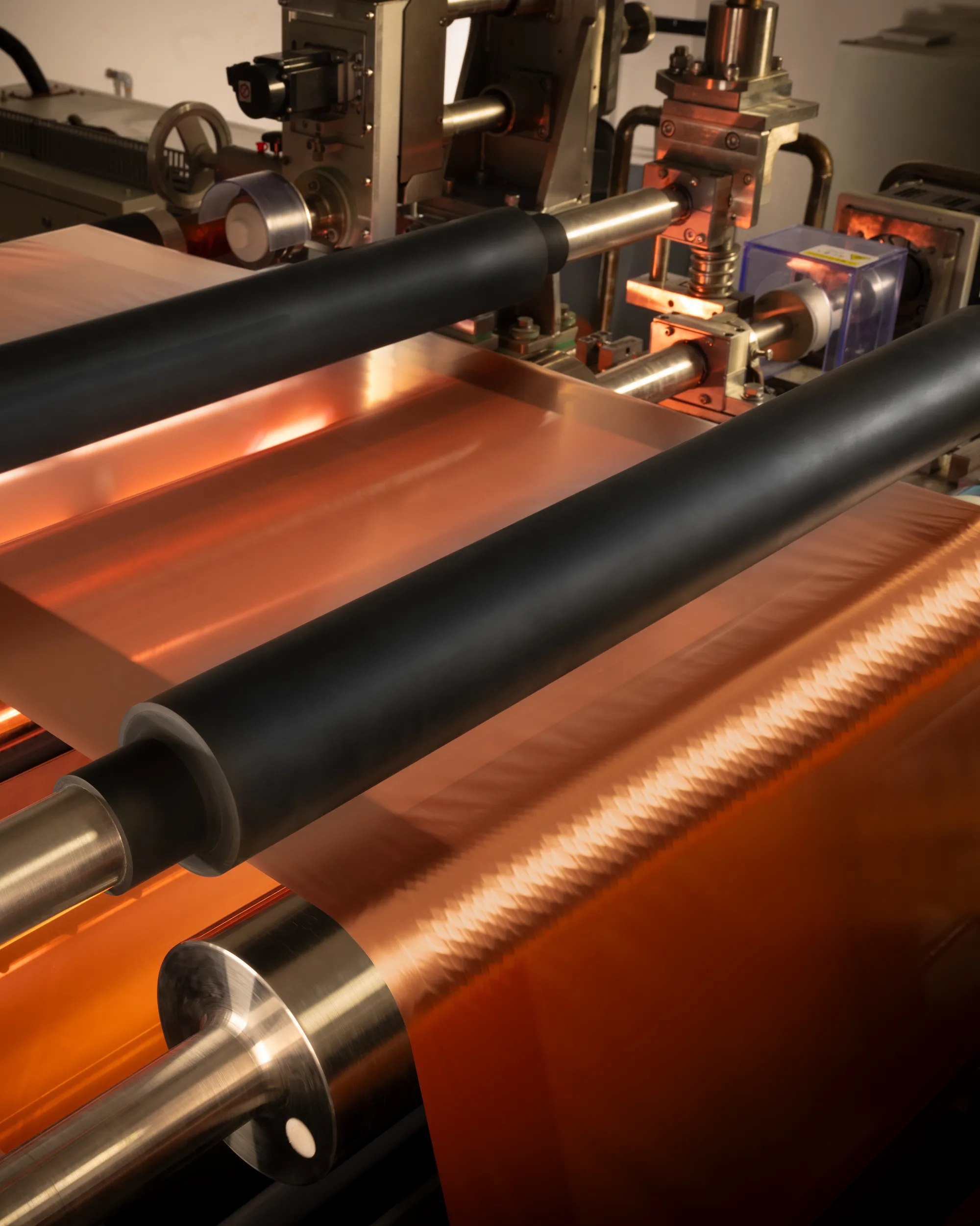 Copper web running through the roll-to-roll line